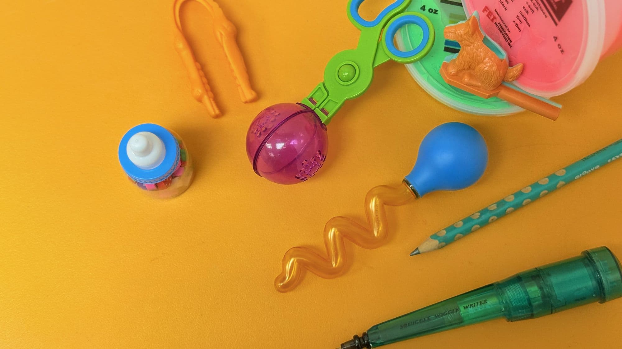 兒童精細動作訓練工具 — TheraPutty、訓練夾子、Squiggle Pen 和書寫筆